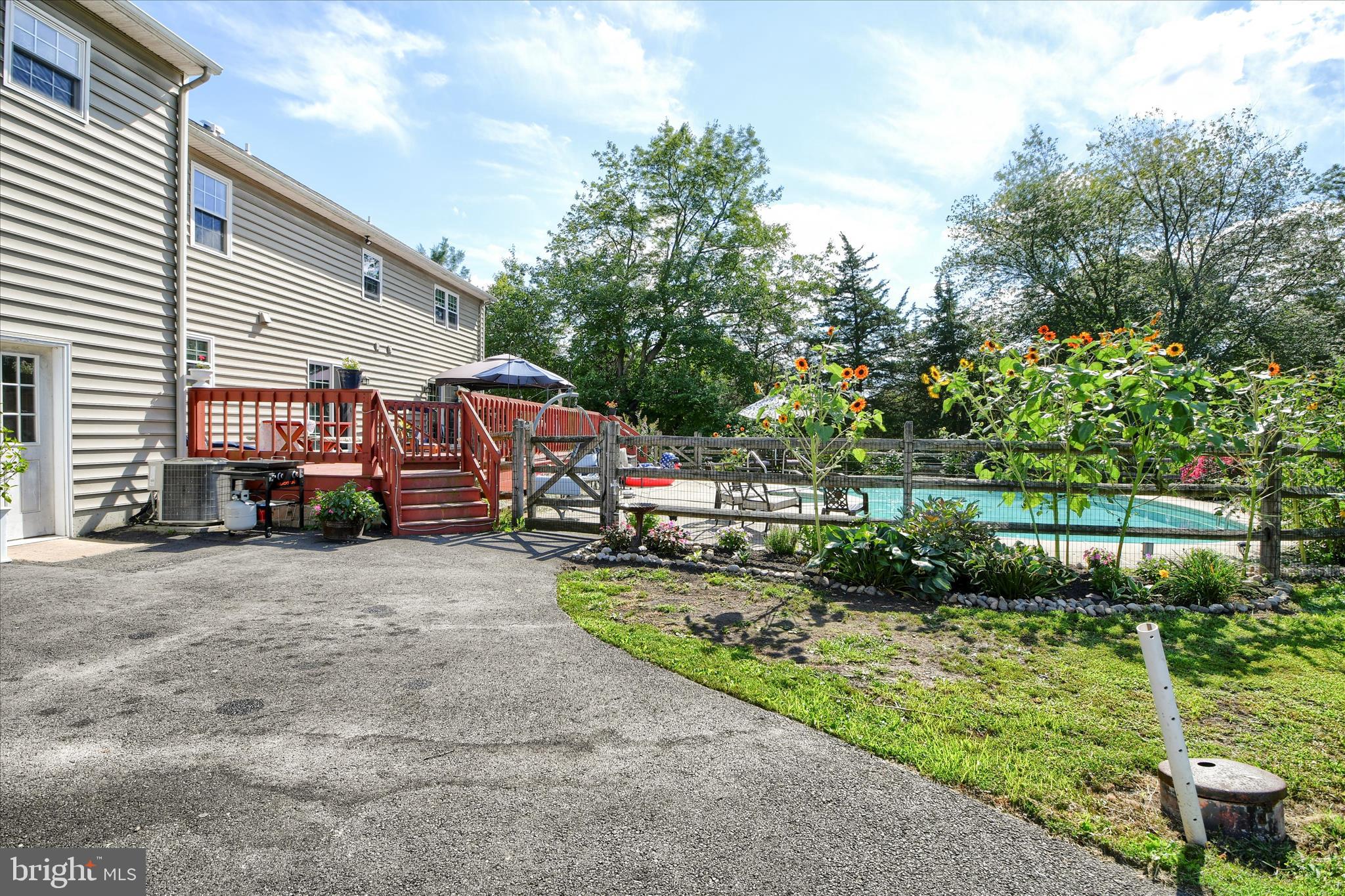 1010 Sweetbriar Road Perkasie, PA 18944 - Photo 49 of 59 a view of a house with backyard and sitting area