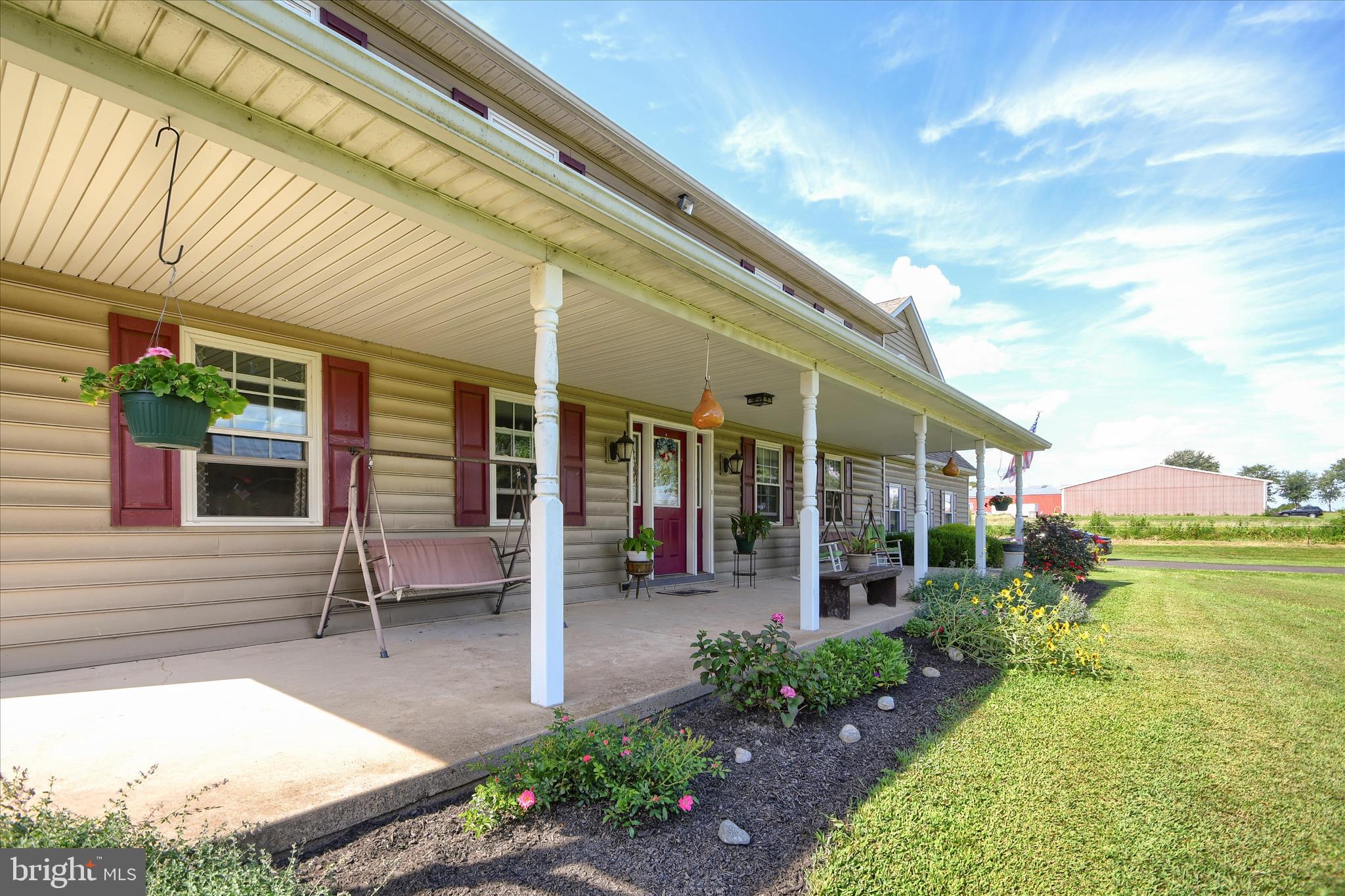 1010 Sweetbriar Road Perkasie, PA 18944 - Photo 5 of 59 a view of a patio with a table and chairs and potted plants