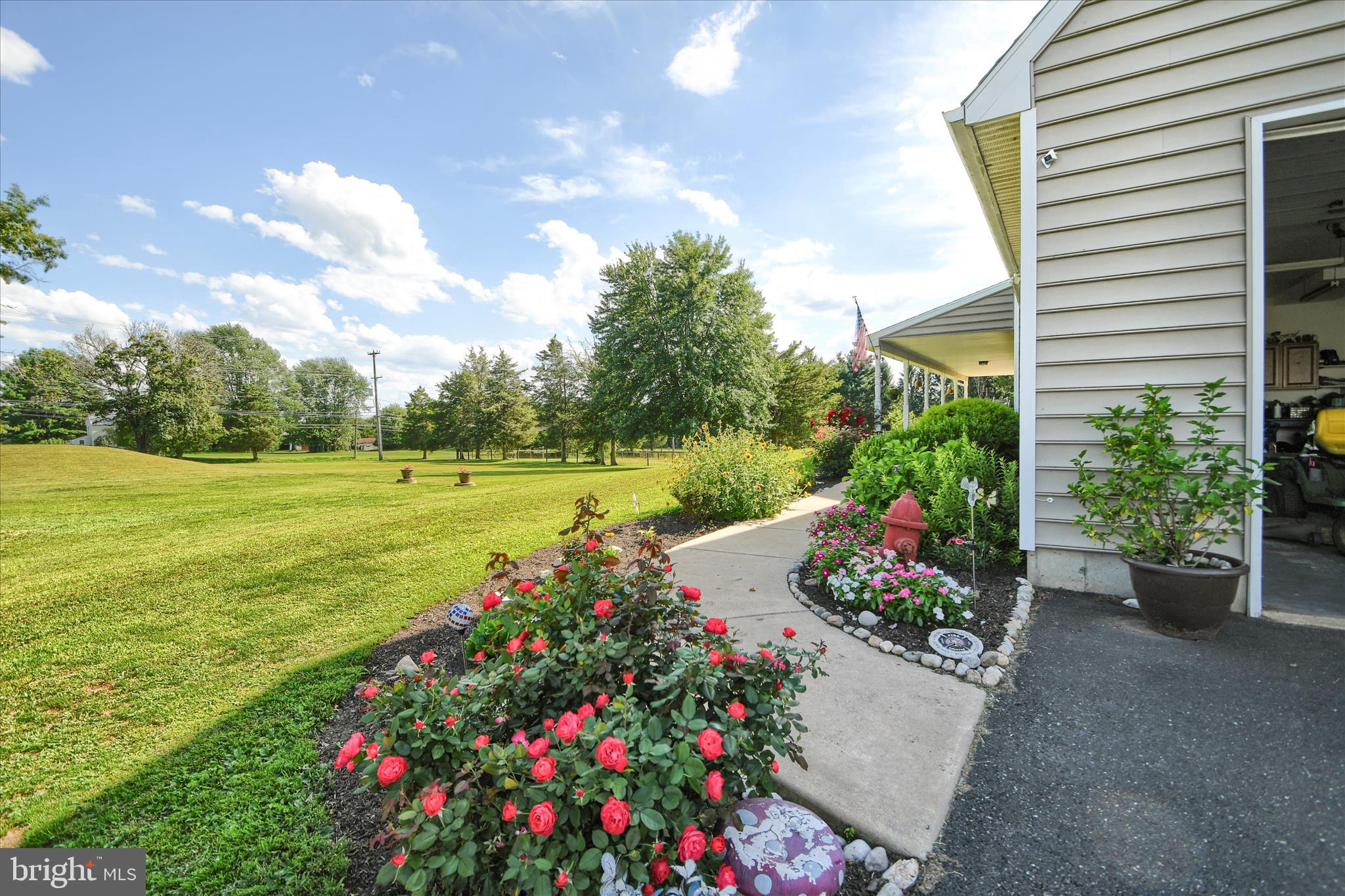 1010 Sweetbriar Road Perkasie, PA 18944 - Photo 55 of 59 a view of a garden with flowers and plants