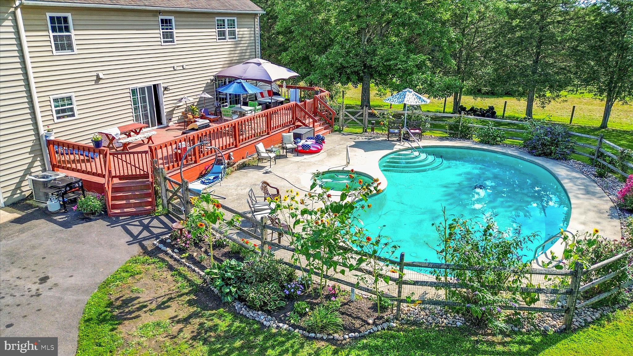 1010 Sweetbriar Road Perkasie, PA 18944 - Photo 58 of 59 a backyard of a house with yard and outdoor seating