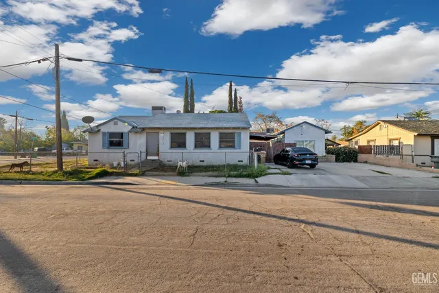 a view of street with parked cars
