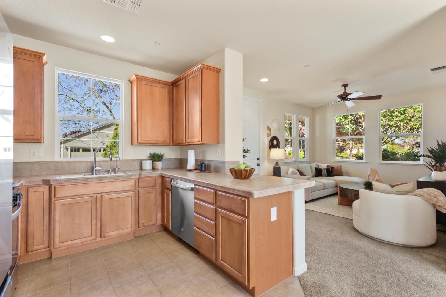 2128 Ragen Place Woodland, CA 95776 - Photo 15 of 40 a kitchen with a sink stove and cabinets