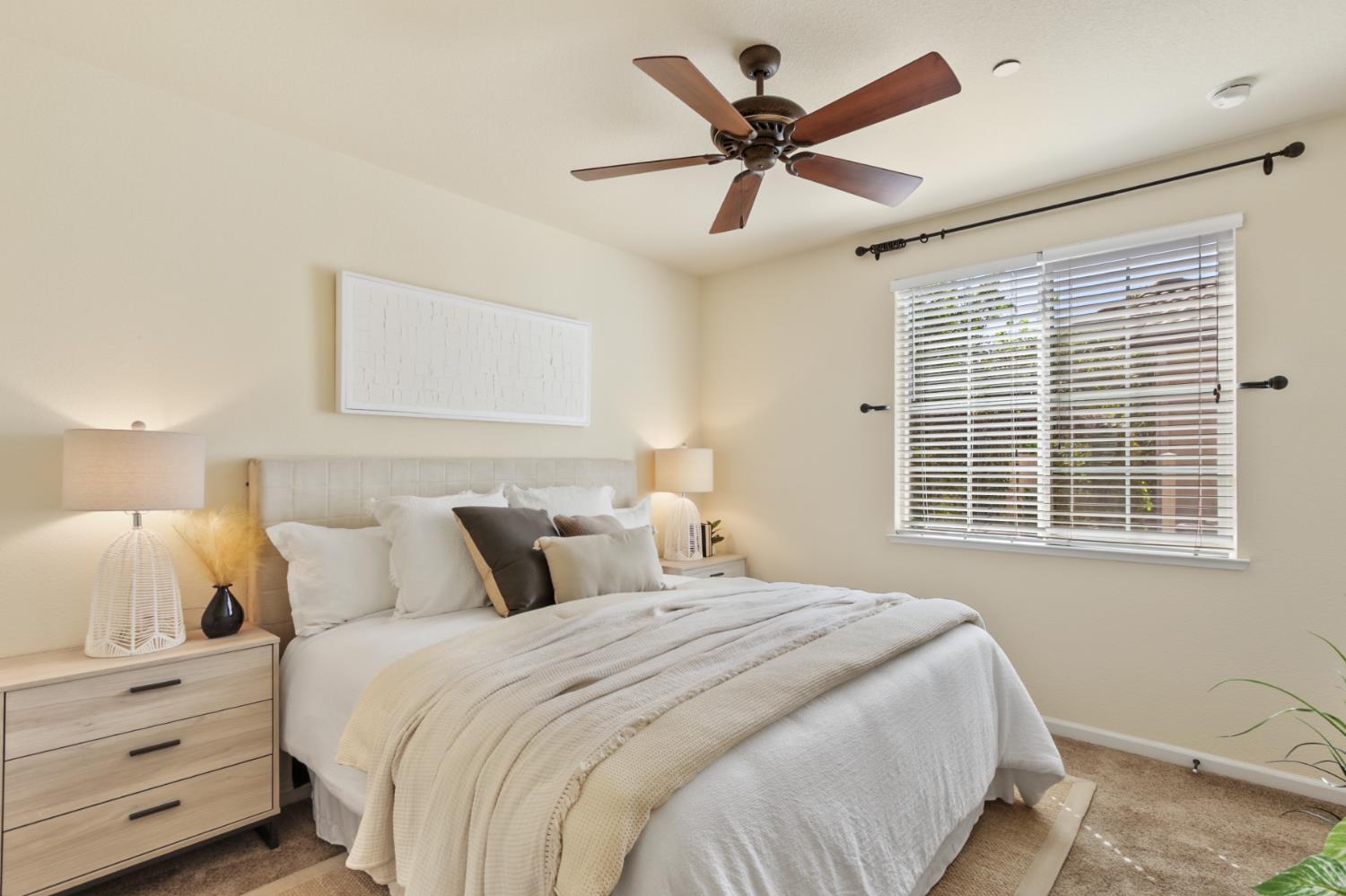 2128 Ragen Place Woodland, CA 95776 - Photo 19 of 40 a bedroom with a large bed and a window