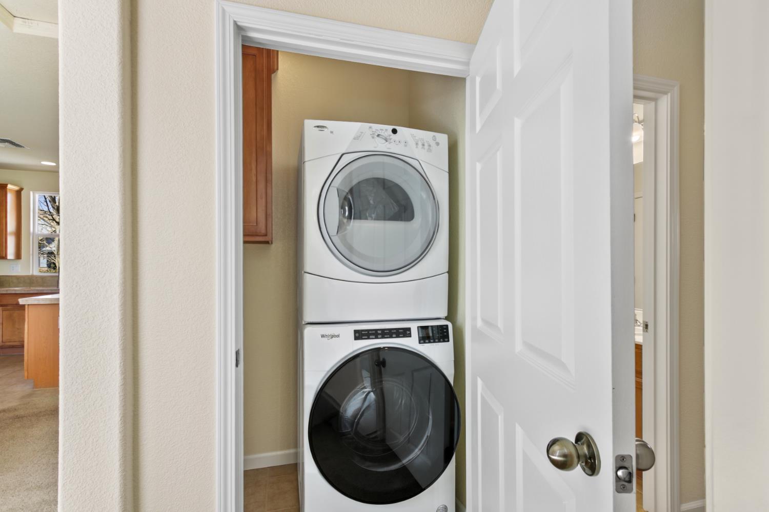 2128 Ragen Place Woodland, CA 95776 - Photo 31 of 40 a utility room with dryer and washer