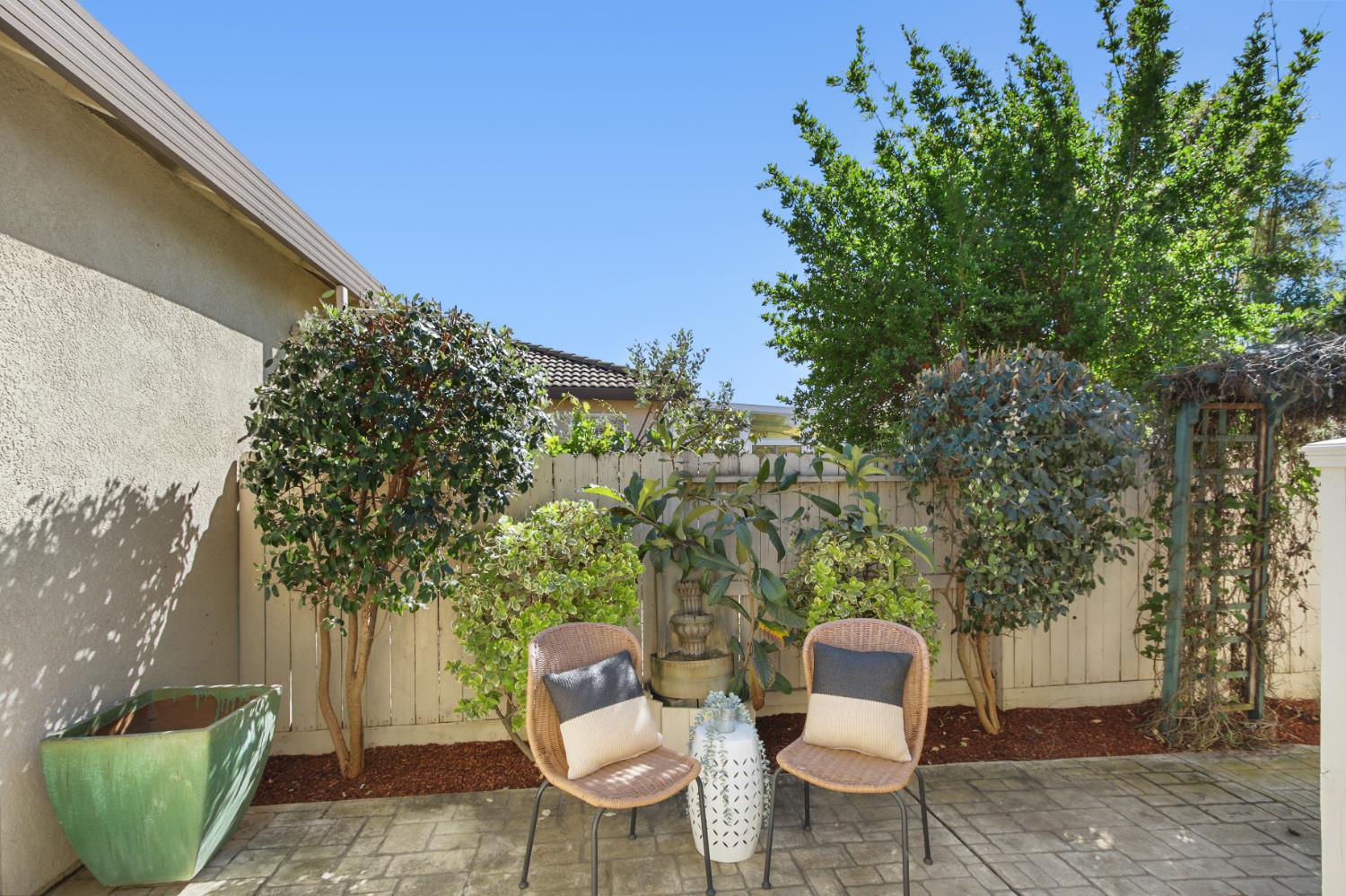 2128 Ragen Place Woodland, CA 95776 - Photo 36 of 40 a view of a chair and table in backyard