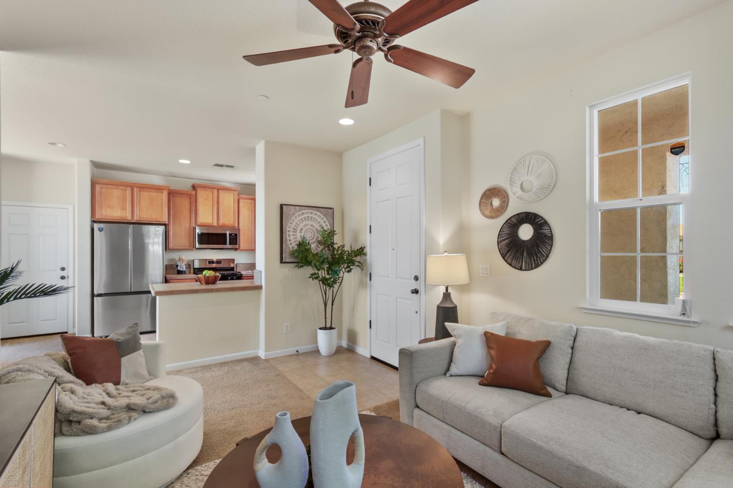 2128 Ragen Place Woodland, CA 95776 - Photo 8 of 40 a living room with furniture and a large window