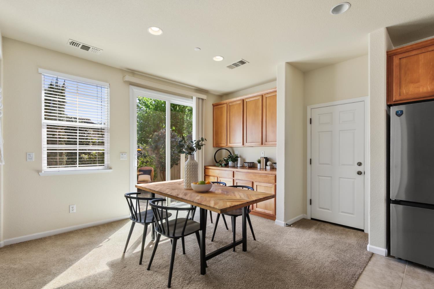 2128 Ragen Place Woodland, CA 95776 - Photo 10 of 40 a view of a dining room with furniture window and outside view