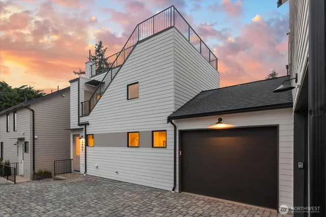 a view of a house with a garage