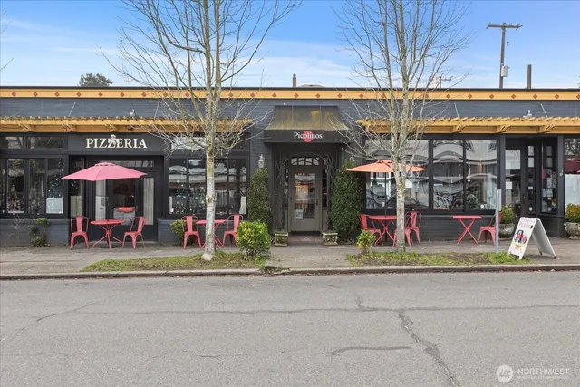 a view of street with shops