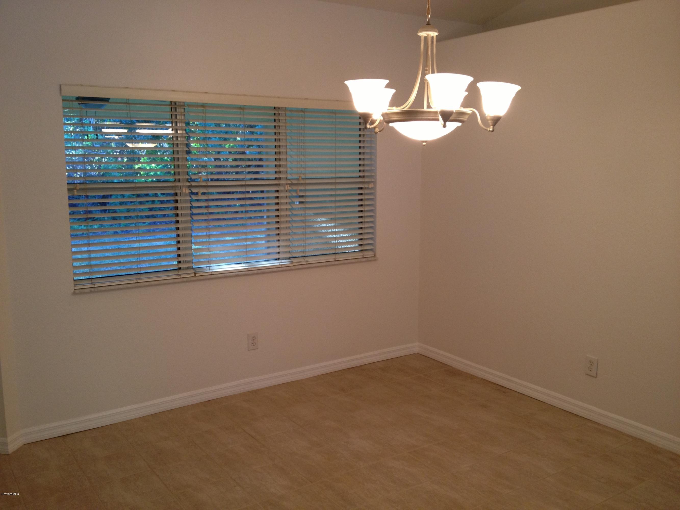 1130 Meadowbrook Road Northeast Palm Bay, FL 32905 - Photo 4 of 13 Eat In Kitchen