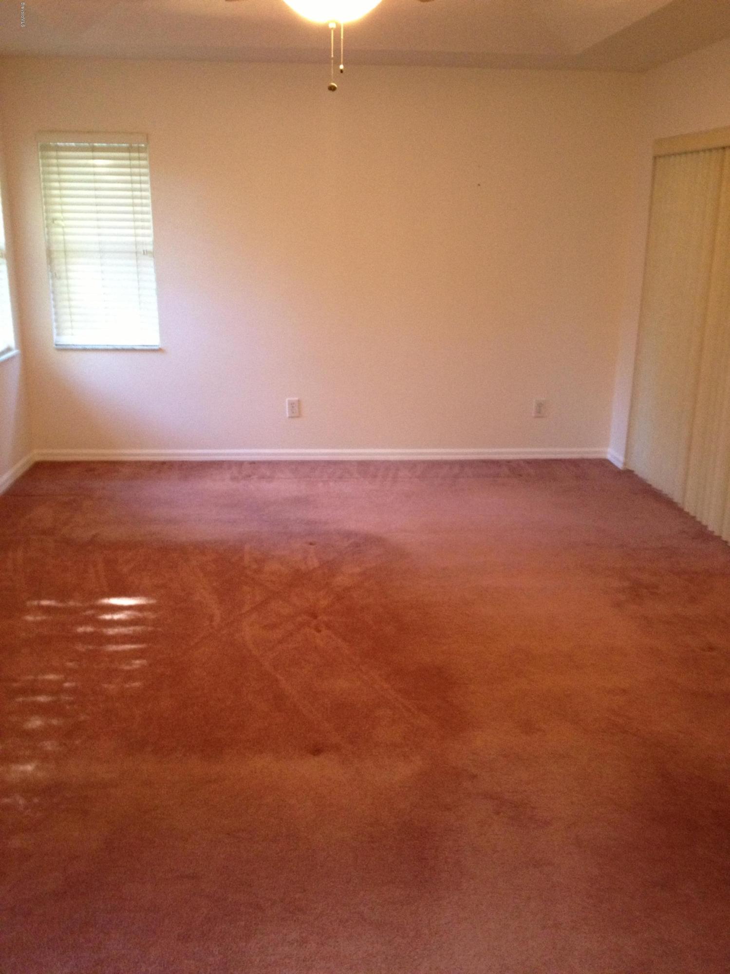 1130 Meadowbrook Road Northeast Palm Bay, FL 32905 - Photo 5 of 13 Master Bedroom