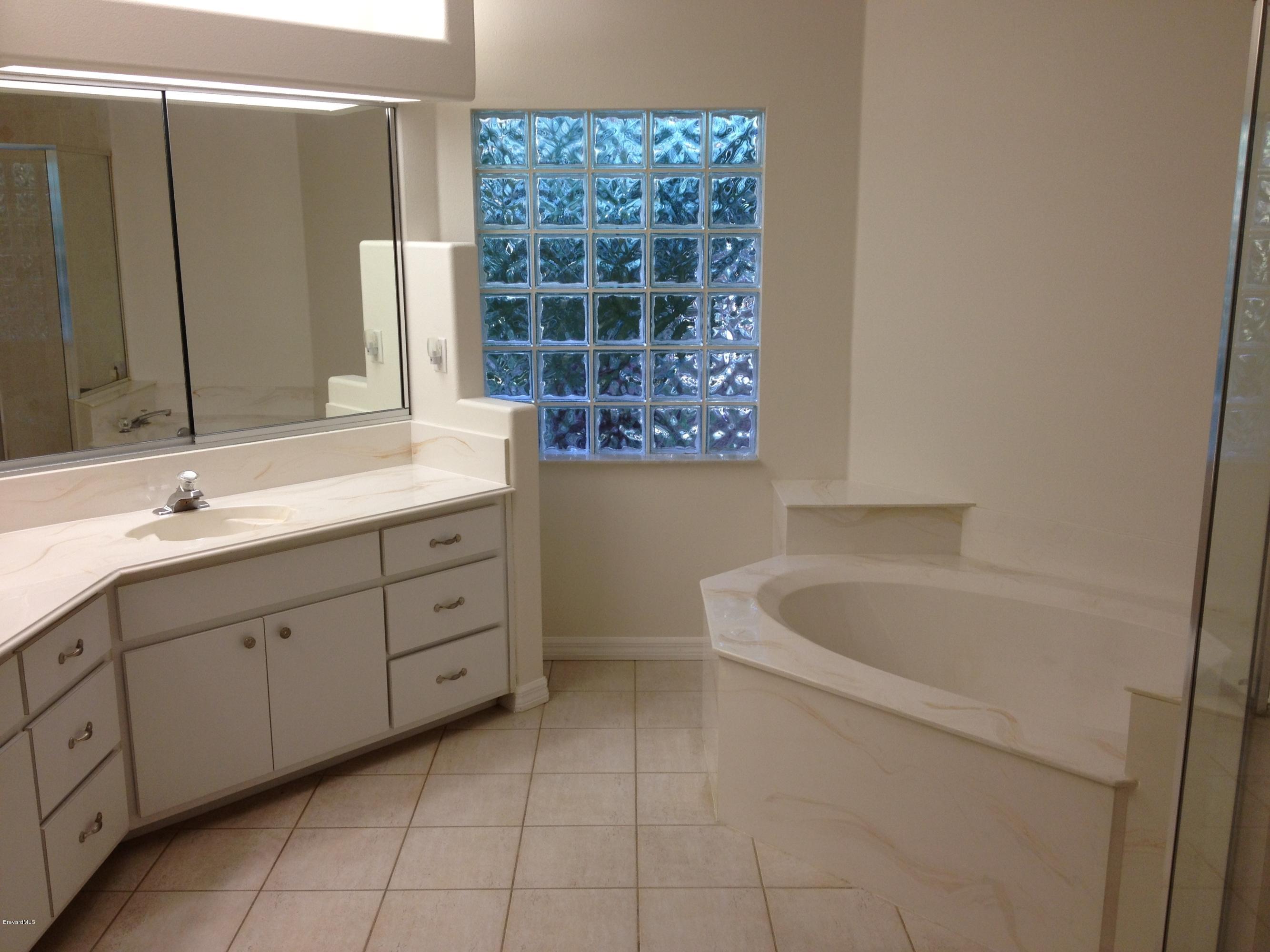 1130 Meadowbrook Road Northeast Palm Bay, FL 32905 - Photo 7 of 13 Master Bath