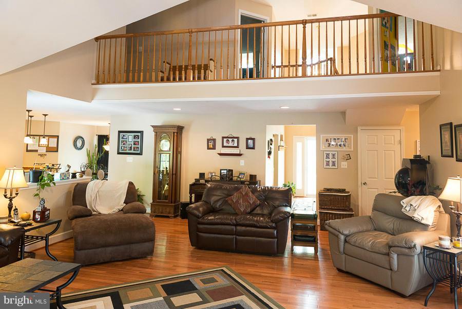 6325 Hawkins Gate Road La Plata, MD 20646 - Photo 2 of 30 Huge family room with wood floors and fireplace
