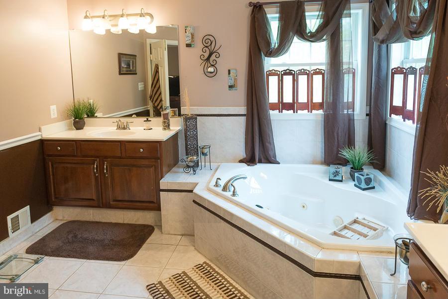 6325 Hawkins Gate Road La Plata, MD 20646 - Photo 16 of 30 Master bath with his and hers vanities