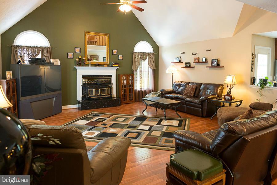 6325 Hawkins Gate Road La Plata, MD 20646 - Photo 3 of 30 Huge family room with wood floors and fireplace