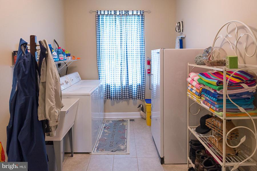 6325 Hawkins Gate Road La Plata, MD 20646 - Photo 24 of 30 Oversized laundry room on master bedroom main lvl