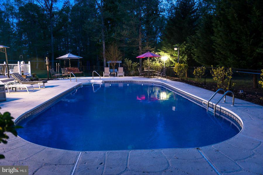 6325 Hawkins Gate Road La Plata, MD 20646 - Photo 28 of 30 In-ground pool with patio and deck area