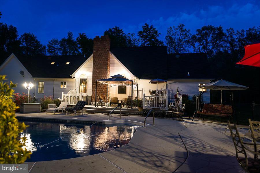 6325 Hawkins Gate Road La Plata, MD 20646 - Photo 29 of 30 In-ground pool with patio and deck area