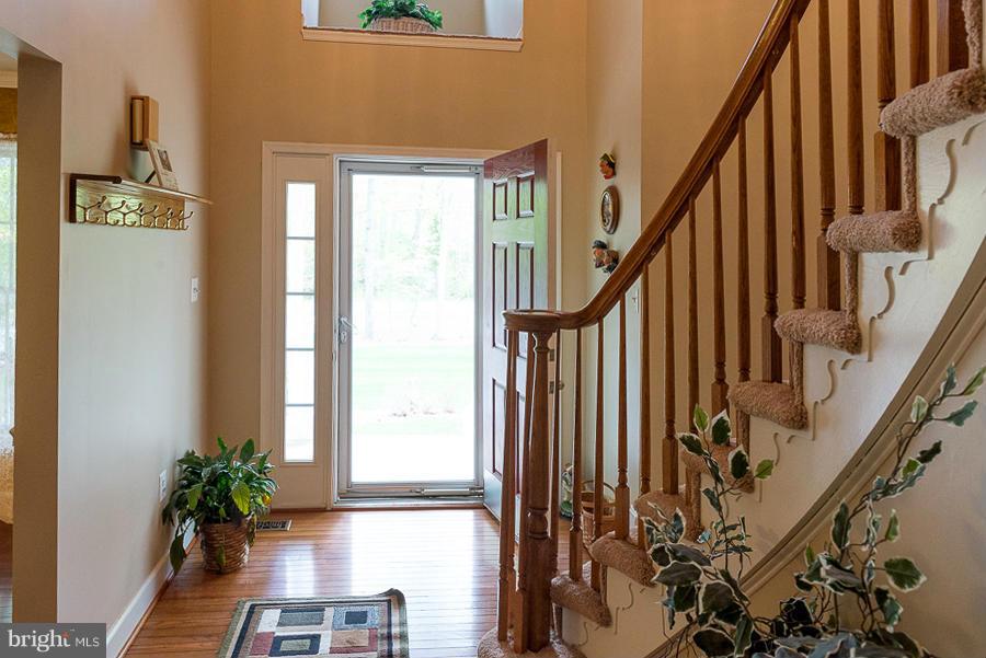 6325 Hawkins Gate Road La Plata, MD 20646 - Photo 10 of 30 Large two story foyer with curved staircase