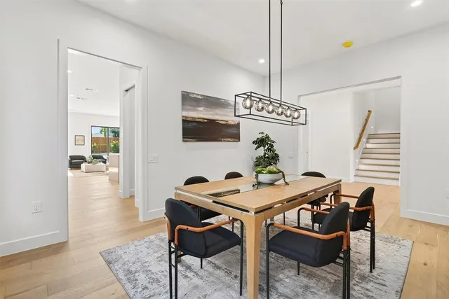 a living room with furniture and windows