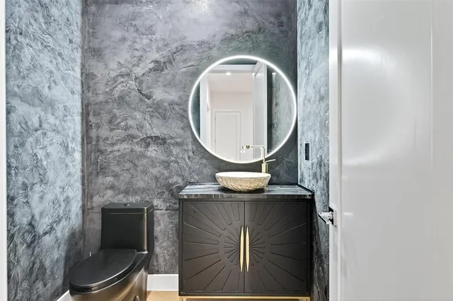 a dining room with furniture window and wooden floor