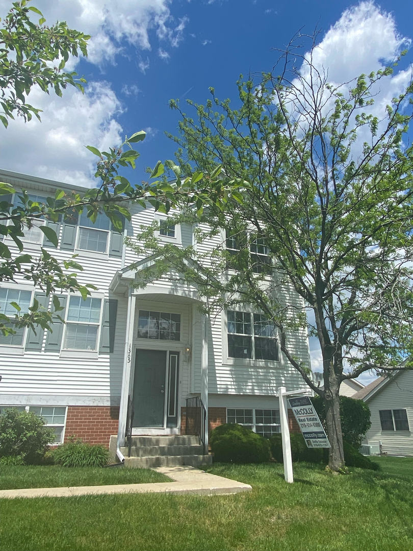 1365 Fox Hound Trail Beecher, IL 60401 - Photo 1 of 22 front view of a house with a yard