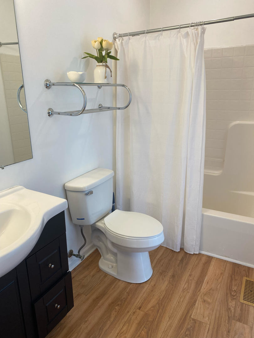 1365 Fox Hound Trail Beecher, IL 60401 - Photo 13 of 22 a bathroom with a toilet and a shower