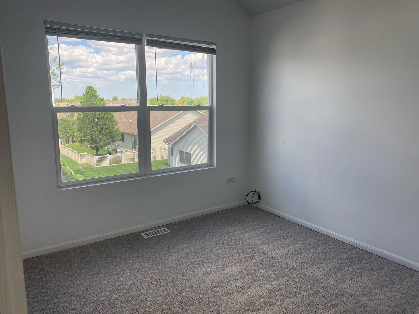 1365 Fox Hound Trail Beecher, IL 60401 - Photo 17 of 22 an empty room with a window