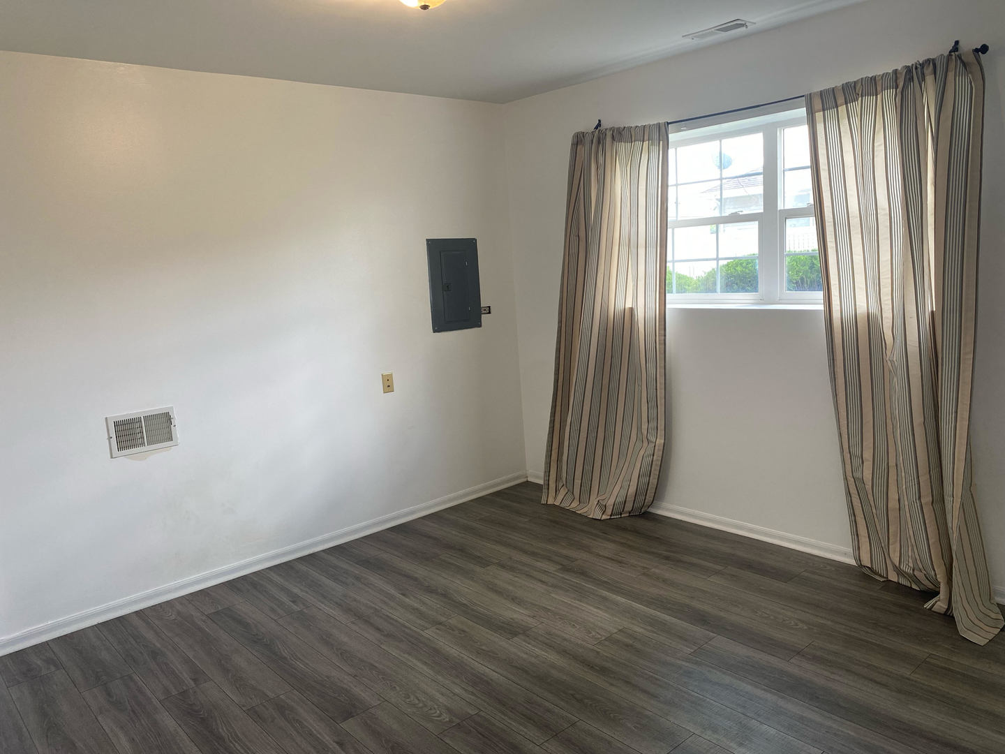 1365 Fox Hound Trail Beecher, IL 60401 - Photo 19 of 22 an empty room with wooden floor and windows