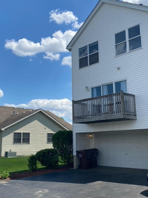 1365 Fox Hound Trail Beecher, IL 60401 - Photo 22 of 22 a view of a house with roof deck