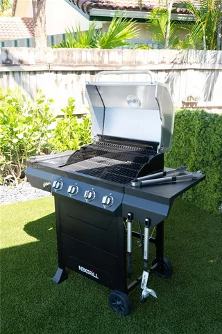 a view of a backyard with sitting area