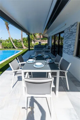 a kitchen with a stove and a table