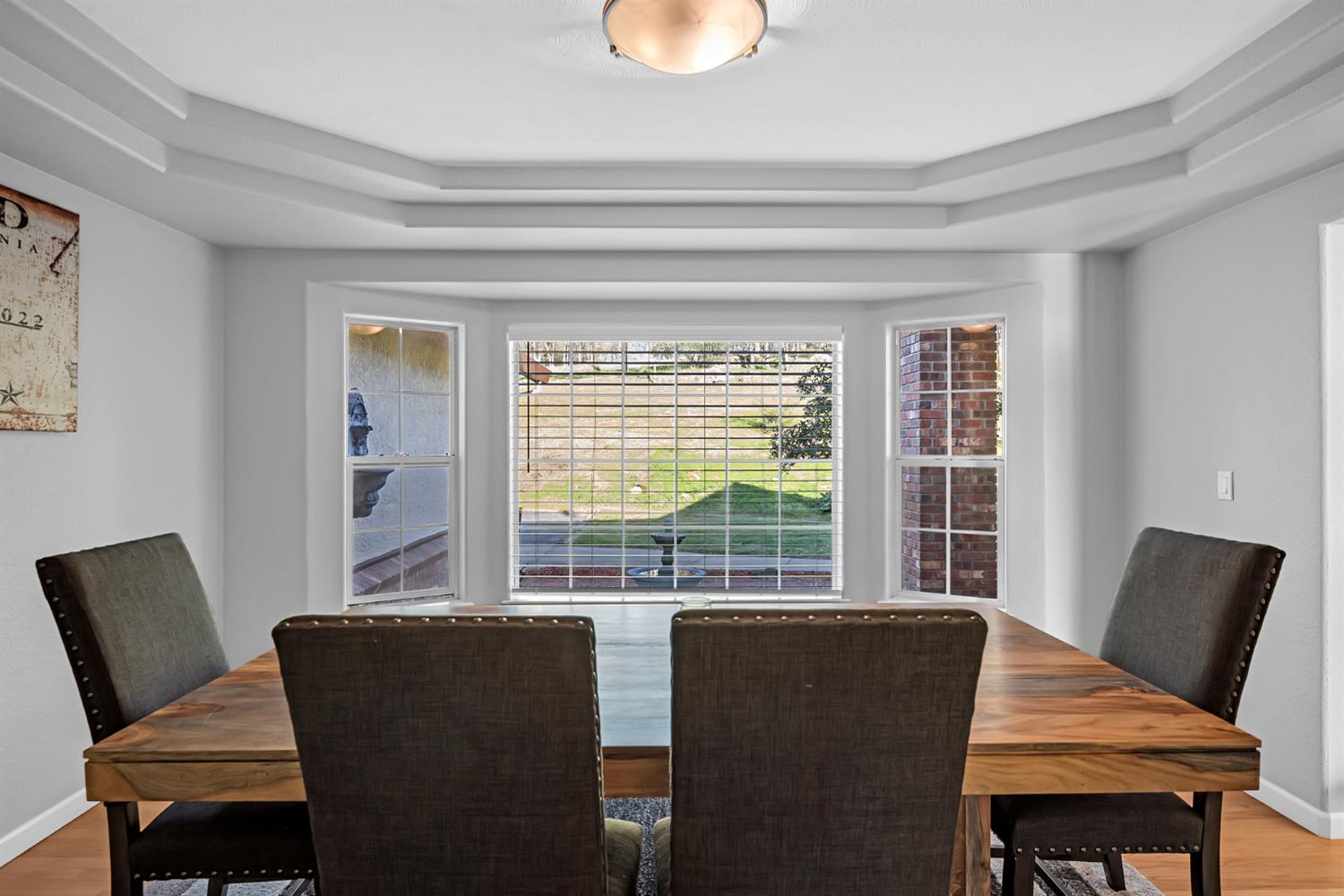 5772 Dragon Springs Road Placerville, CA 95667 - Photo 17 of 85 a view of a dining room with furniture and window