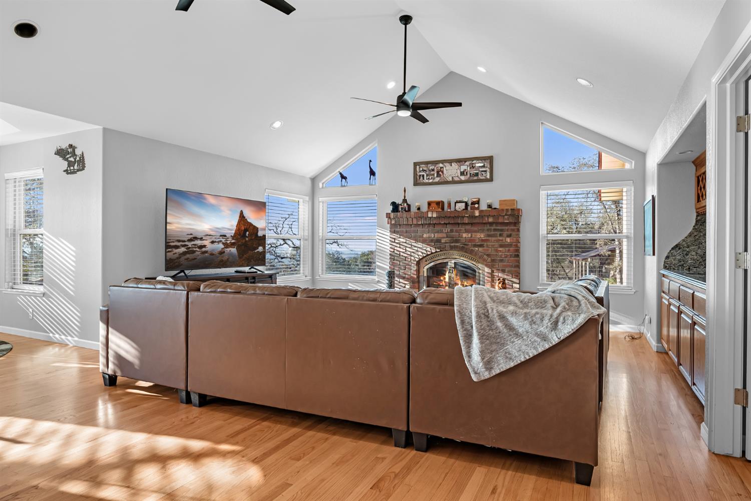 5772 Dragon Springs Road Placerville, CA 95667 - Photo 19 of 85 a living room with furniture and a flat screen tv