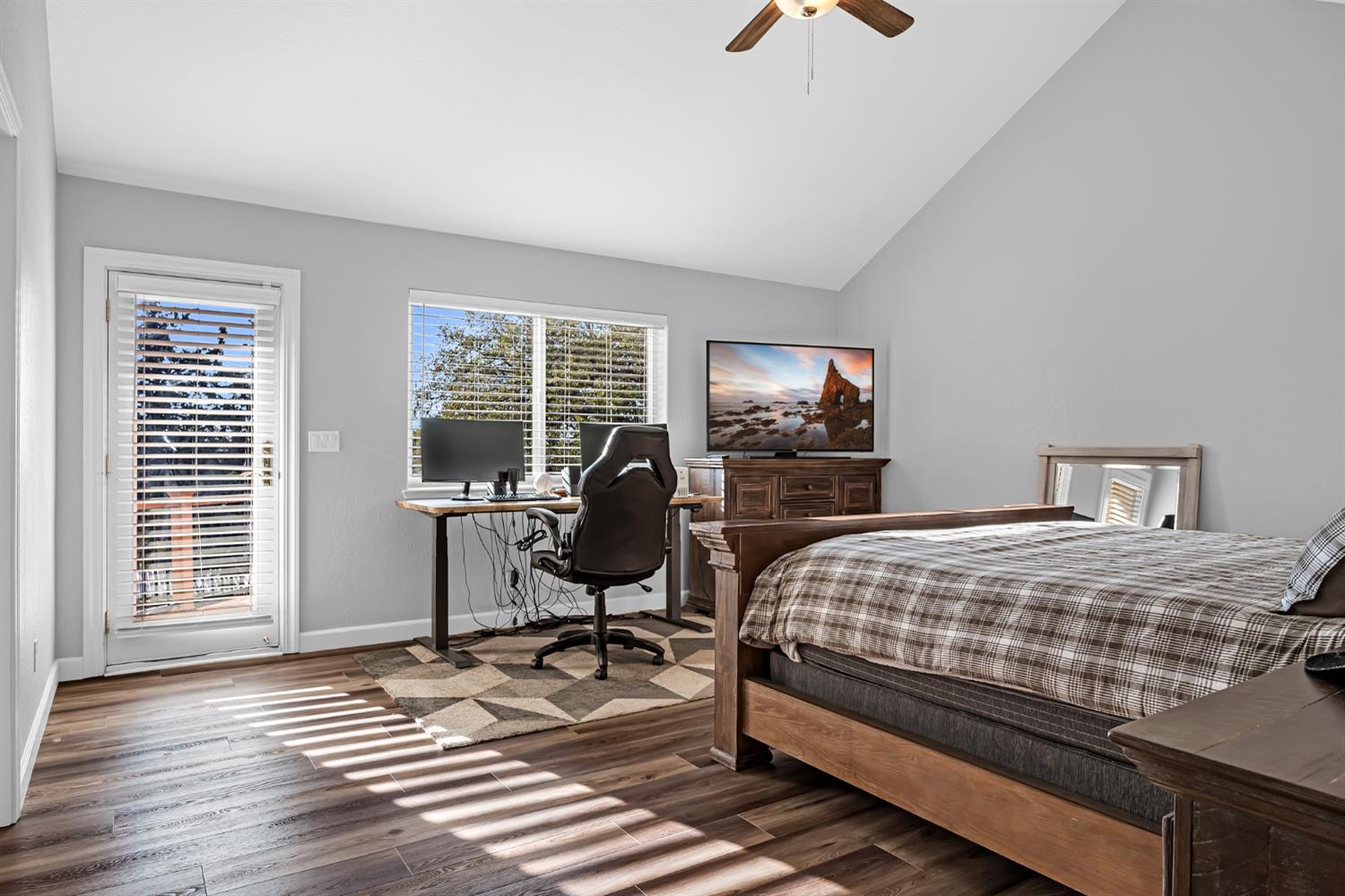 5772 Dragon Springs Road Placerville, CA 95667 - Photo 34 of 85 a bedroom with a bed and wooden floor