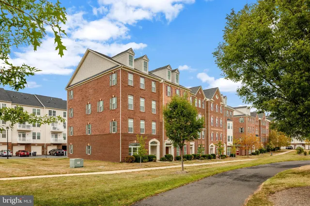 a view of a building with a street