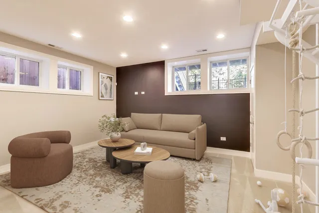 a living room with furniture and a window