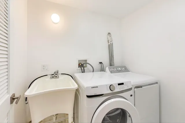 a utility room with dryer and washer