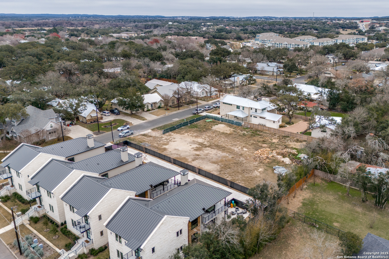 an aerial view of residential house with outdoor space