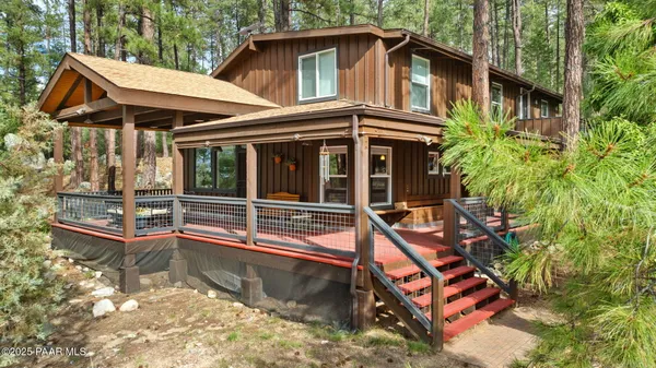 a house with trees in front of it