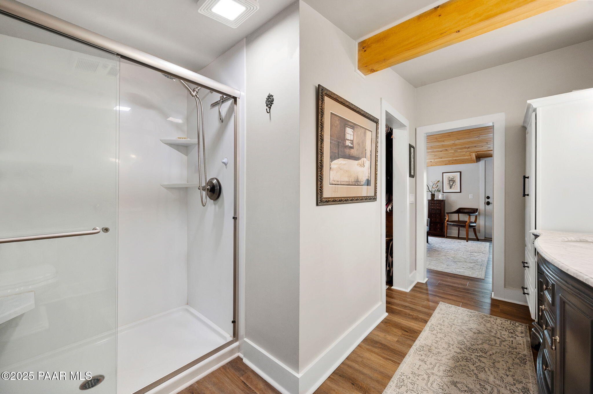 6231 South Champion Way Road Prescott, AZ 86303 - Photo 16 of 43 a bathroom with a glass shower door
