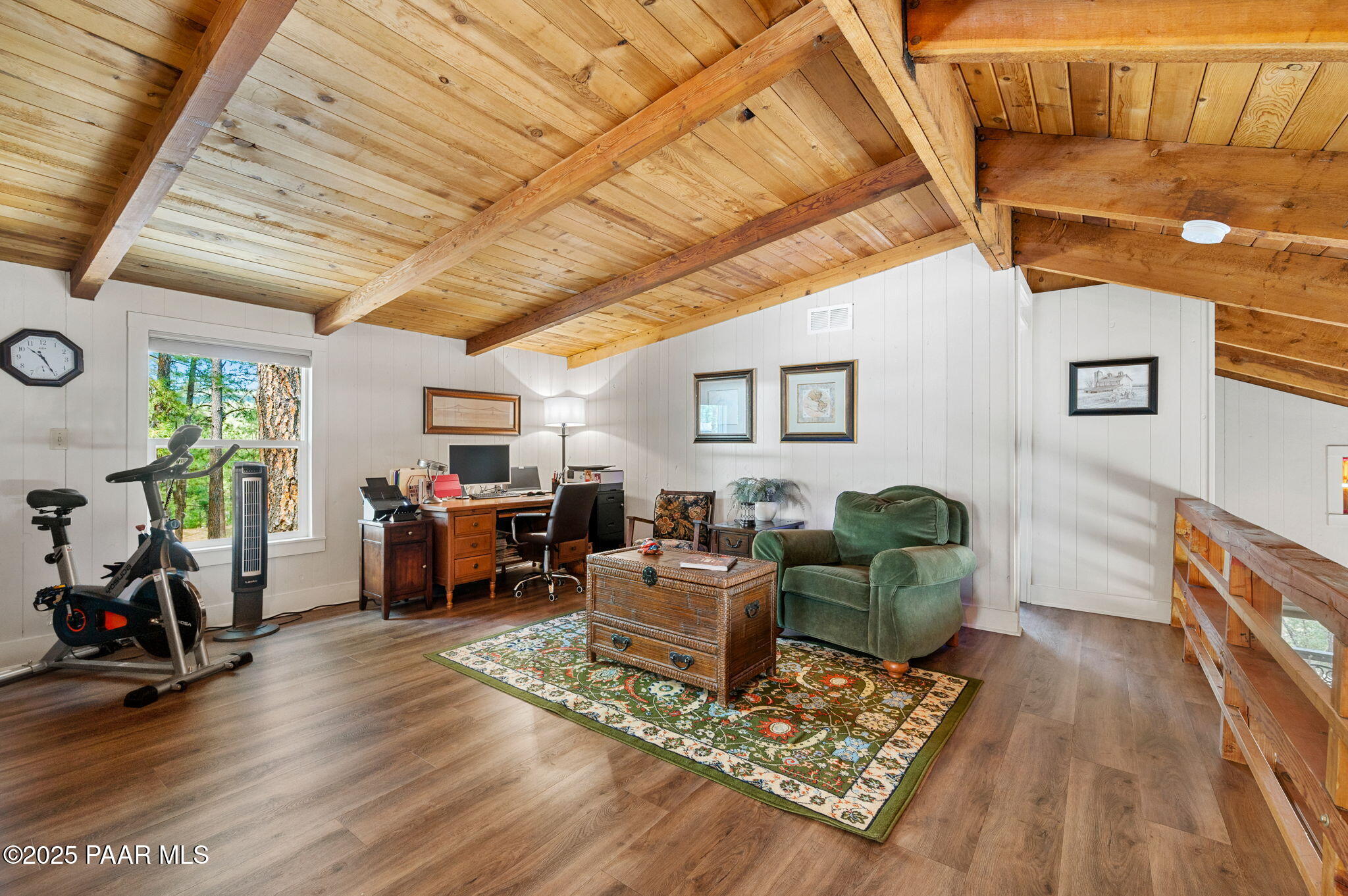 6231 South Champion Way Road Prescott, AZ 86303 - Photo 21 of 43 a living room with furniture and a wooden floor