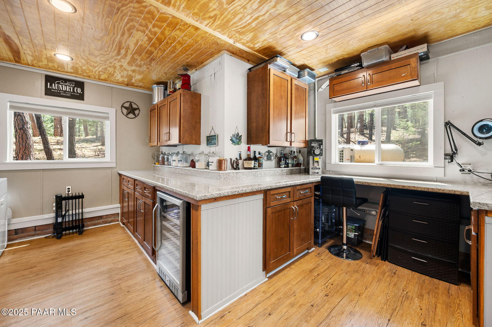 6231 South Champion Way Road Prescott, AZ 86303 - Photo 24 of 43 a kitchen with stainless steel appliances granite countertop a sink stove and cabinets