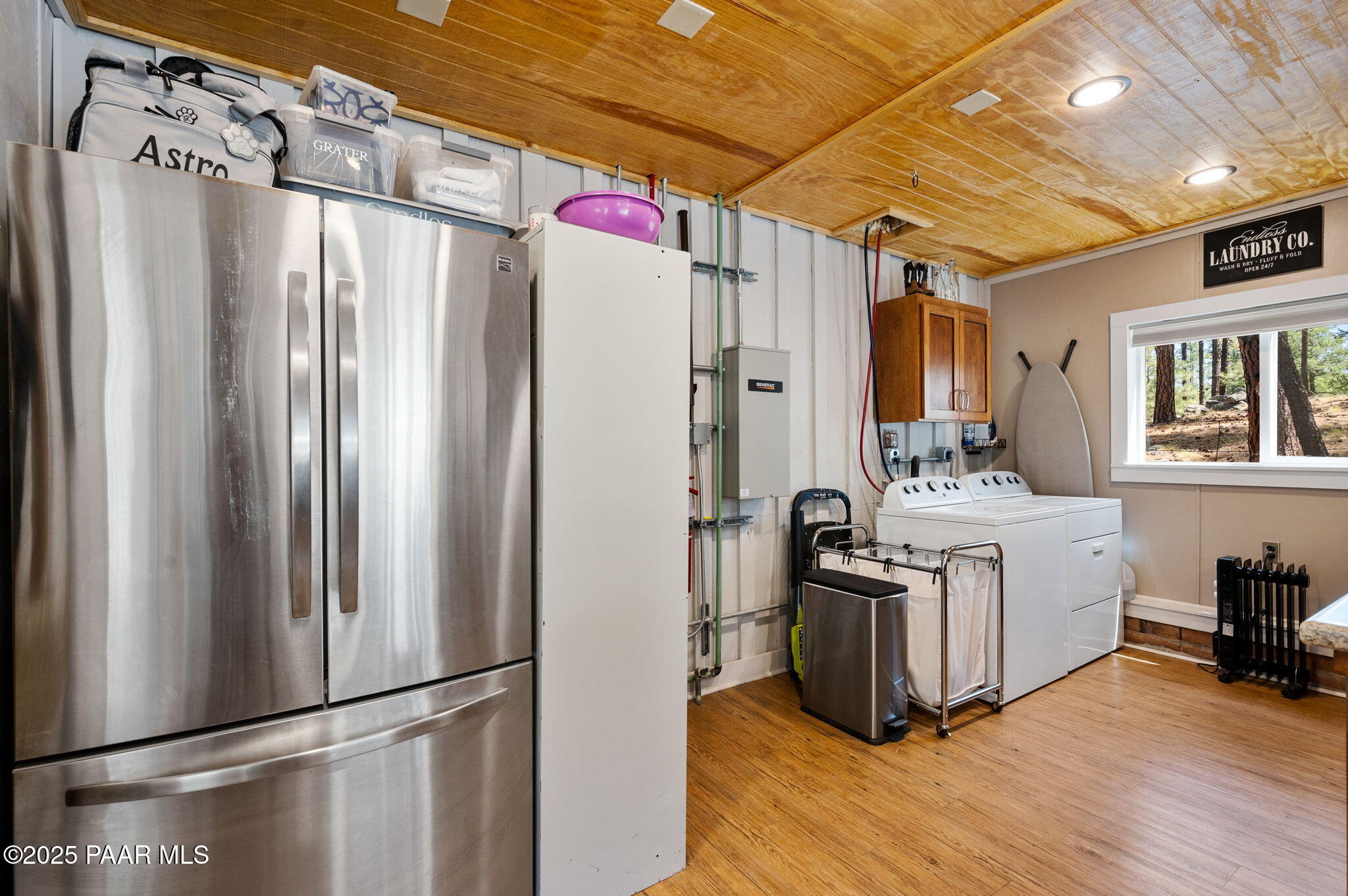 6231 South Champion Way Road Prescott, AZ 86303 - Photo 25 of 43 a kitchen with stainless steel appliances granite countertop a refrigerator a stove and a refrigerator