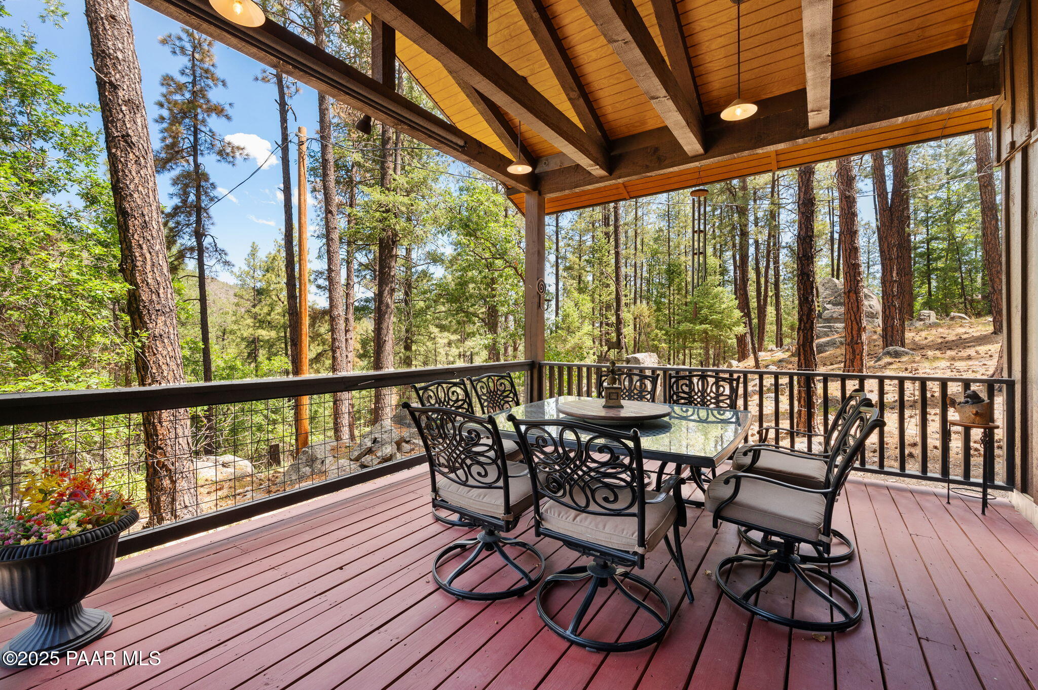 6231 South Champion Way Road Prescott, AZ 86303 - Photo 28 of 43 a view of a balcony with furniture and wooden floor