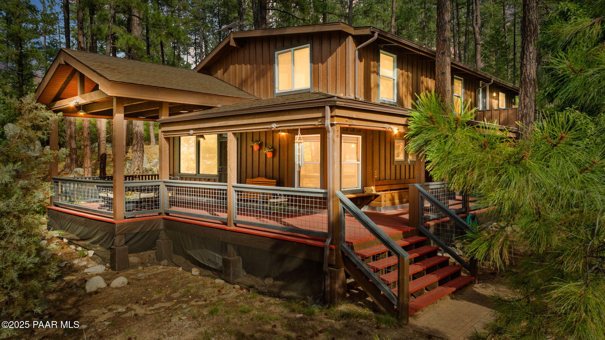 6231 South Champion Way Road Prescott, AZ 86303 - Photo 3 of 43 a small house with a clock on the wall