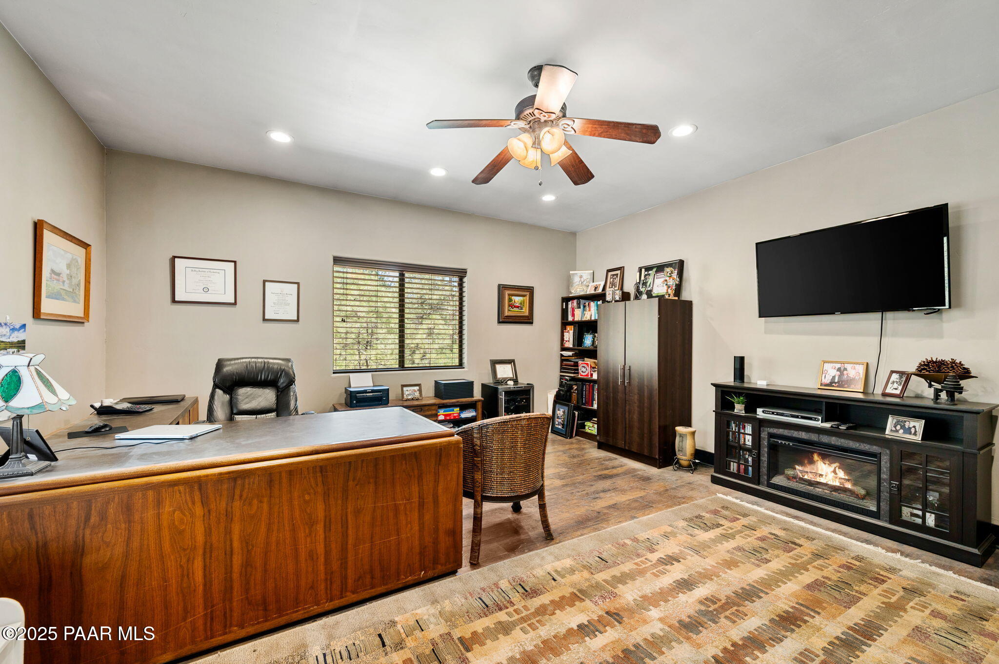 6231 South Champion Way Road Prescott, AZ 86303 - Photo 34 of 43 a view of a livingroom with furniture window and a flat screen tv