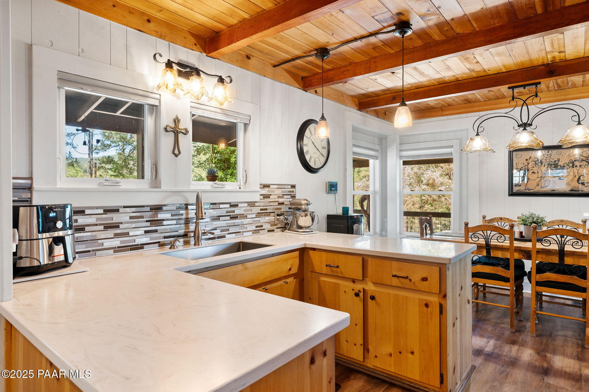 6231 South Champion Way Road Prescott, AZ 86303 - Photo 9 of 43 a large white kitchen with a large window