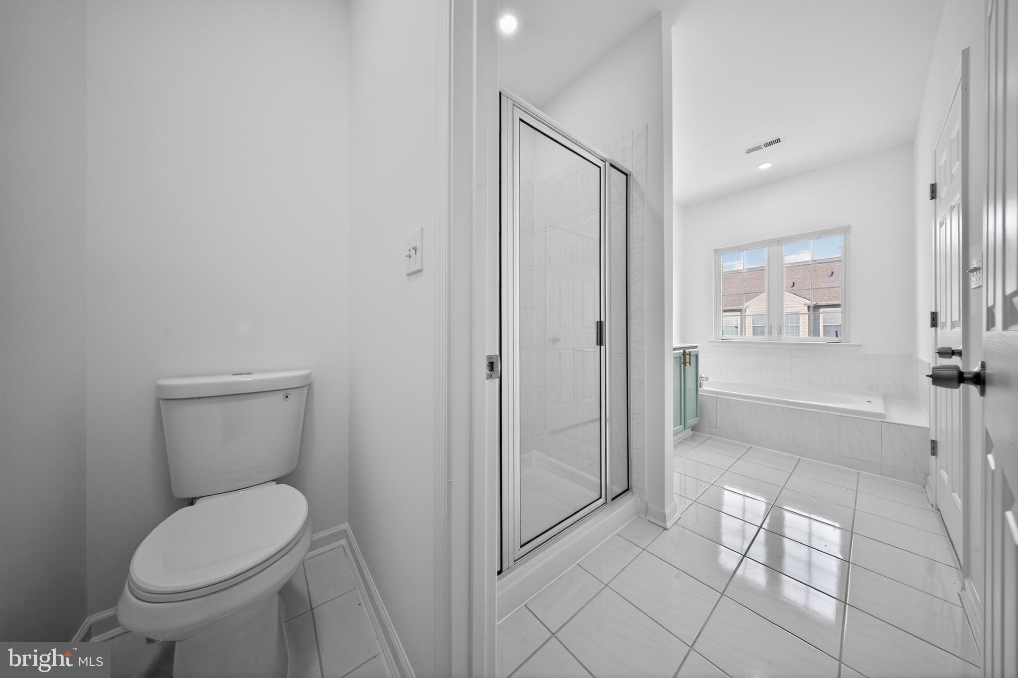 3 Swan Court Delran, NJ 08075 - Photo 23 of 34 a bathroom with a toilet and a shower