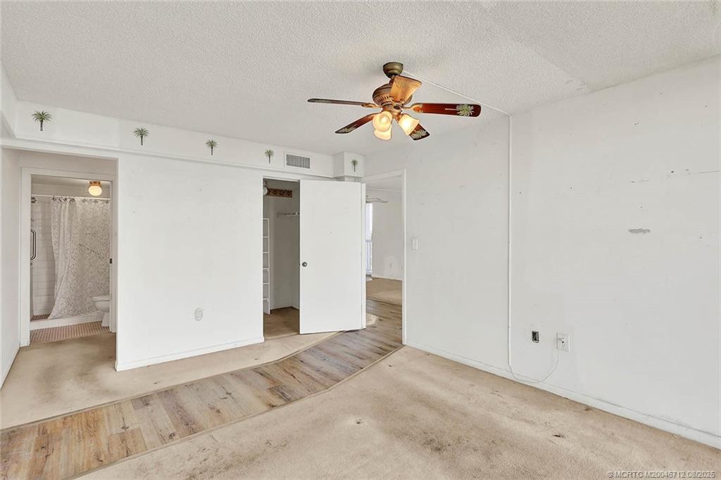 10600 South Ocean Drive, Unit 201 Jensen Beach, FL 34957 - Photo 24 of 40 a view of a room with wooden floor